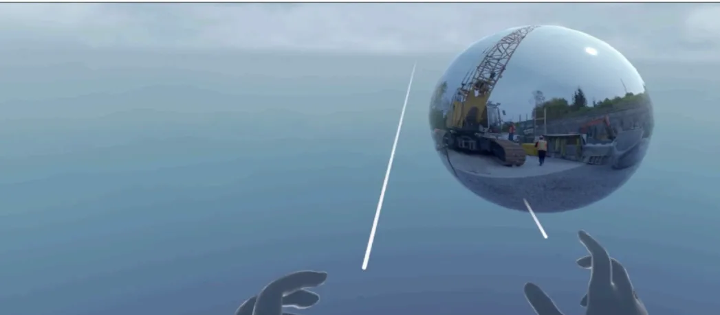 VR view of hands reaching toward a floating 360 video sphere